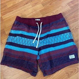 Maroon, purple, and blue patterned Modern Amusement bathing suit from PacSun.